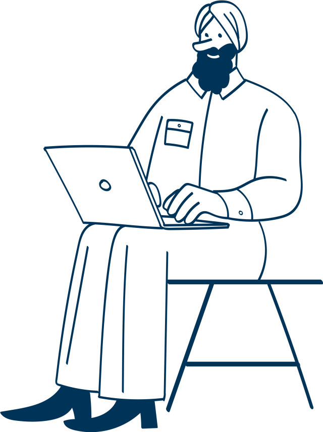 working on computer facing left