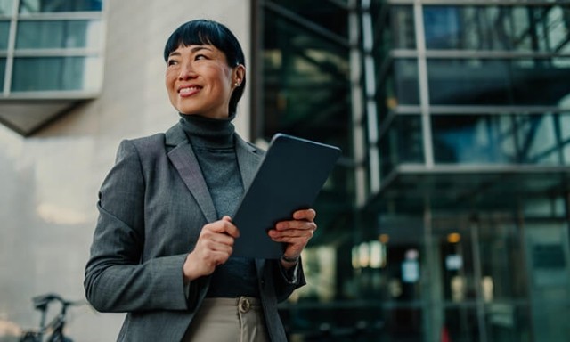 Woman holding a tablet