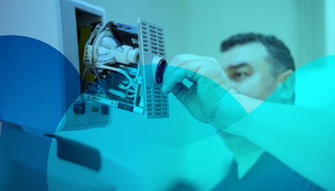Worker fixing machine in a hospital